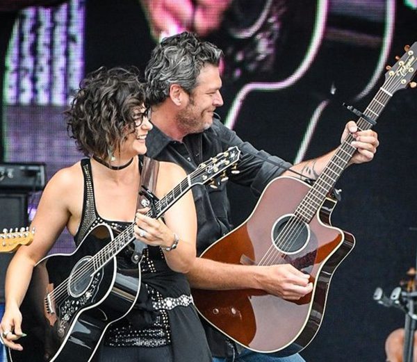 Jenee Fleenor and Blake Shelton playing Takamine guitars on stage